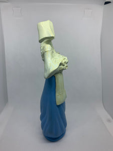 Avon Vintage Bottle Maiden Carrying Flower Bouquet Topaze Cologne Blue