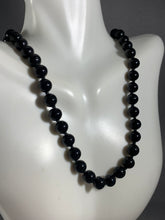 Load image into Gallery viewer, Vintage Monet Black &amp; Gold Tone Necklace 15-17 Inch