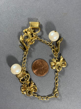 Load image into Gallery viewer, Vintage Gold Tone Chain White Faux Pearl and Charms Bracelet 7.25 Inch